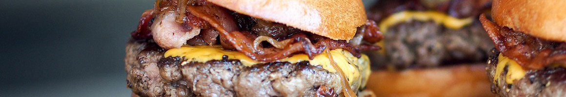 Eating Burger at Slidin Dirty restaurant in Troy, NY.